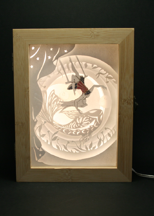 Lampe-papier-découpé-allumée