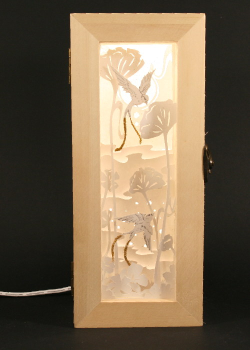 lightbox les oiseaux allumée